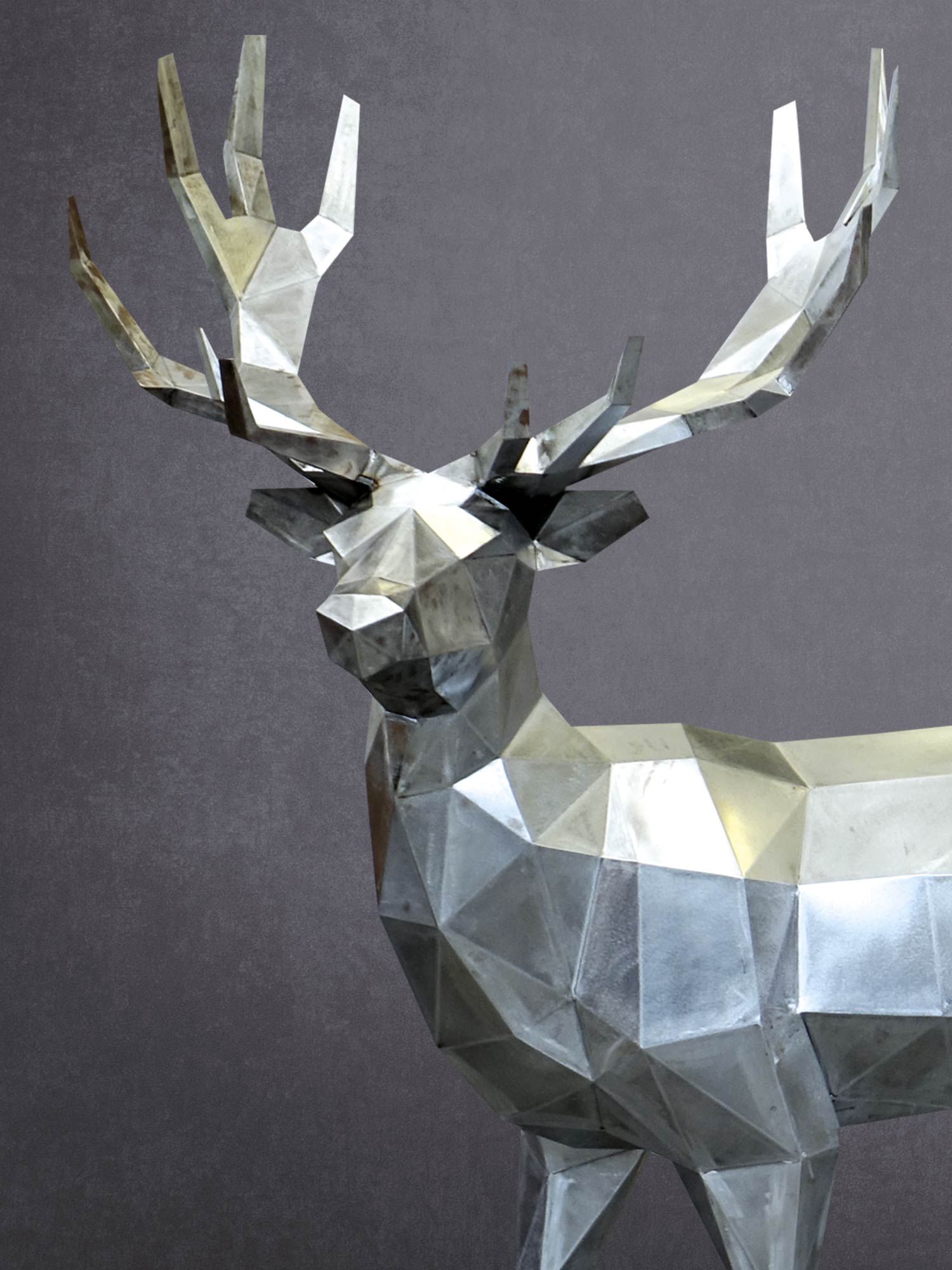 Metal sculpture of a deer by Hilep²